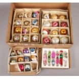 A box of vintage glass Christmas decorations/ baubles.