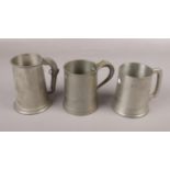 Three English Pewter Tankards to include, an Pewter tankard made in Sheffield with pistol handle,
