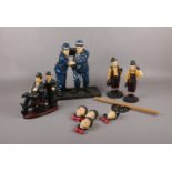 A group of Laurel & Hardy ceramic figure's, with wind chime example