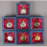 Seven boxed decorative quartz pocket watches.