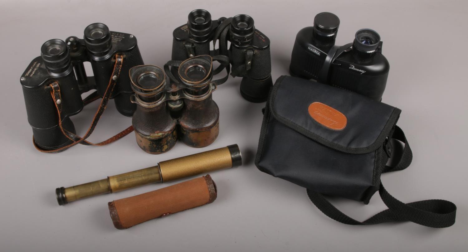 An Embeeco telescope with canvas case along with a quantity of binoculars to include Halina,