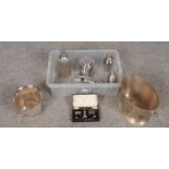 A box of metalwares to include silver plate cruet set by Walker & Hall, ice buckets, Sparklets