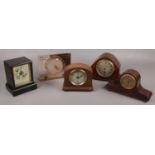 Five small mantel clocks to include Kienzel, glass, American alarm clock etc.