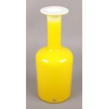 A Holmegaard gul vase, Yellow with white glass interior designed by Ottoe Brauer. 31cm high. No