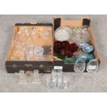 Two boxes of miscellaneous glassware, included wine glasses, candle sticks and bowls etc.