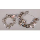 Two silver charm bracelets, with silver and white metal charms.