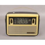 A Bakelite radio "Vef-Tranzistors" Mid 20th Century in cream and black, Height 19cm x 26cm wide.