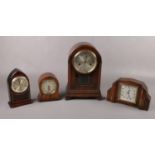 Four wooden mantel clocks to include, a Duke U.M wind up clock, and a French made art deco style