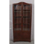 An oak glazed bookcase - (175cm Height x 77cm wide x 26cm depth)