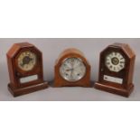 Two American alarm clocks along with a dome top James Walker mantel clock.