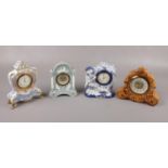 Four ceramic alarm clocks to include, a Landex Royal craft and Coral in china blue and white etc.