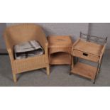 Three pieces of rattan furniture to include coffee table, chair, etc.