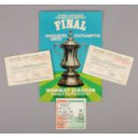 A 1976 FA Cup final football souvenir programme, Manchester United vs Southampton, with two