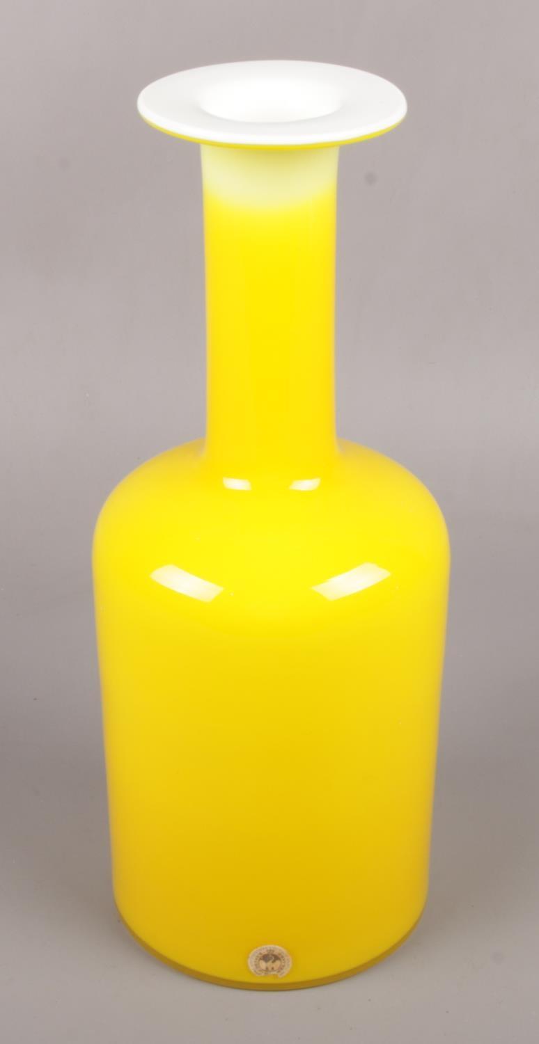A Holmegaard gul vase, Yellow with white glass interior designed by Ottoe Brauer. 31cm high. No - Image 2 of 2