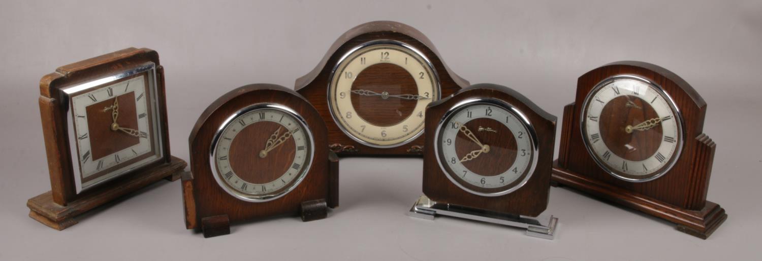 Five oak Bentina 8 day mantel clocks to include dome top examples etc. Only two clocks wind. Keys