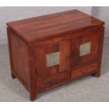 A Chinese hardwood side cabinet with stone inset doors. (66cm x 85cm)