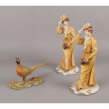 Two duplicate Capo-Di-Monte figurines of a Lady, to include a Border Fine Arts Pheasant figure