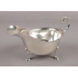 A silver sauceboat assayed Birmingham 1965 by Walker & Hall. (234g).