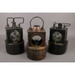 Three vintage LMS railway petroleum signal lamps. One rusted and missing glass. Only one lamp with