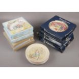 A collection of mainly boxed cabinet plates, to include Wedgwood Peter Rabbit Christmas examples,