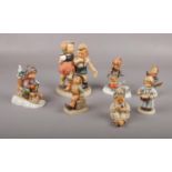 Seven Goebel ceramic figures, Ride into Christmas Hum 396, Little Hiker Hum 16 examples Good
