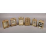 Six various makes of brass carriage clocks with quartz movements, included Junghans, Metamec and
