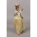 A Lladro figure ' A bird on hand' No. 2151, issued 1985, 30cm height Head repaired. Thumb missing.