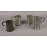 A Victorian pewter tankard and three other similar examples