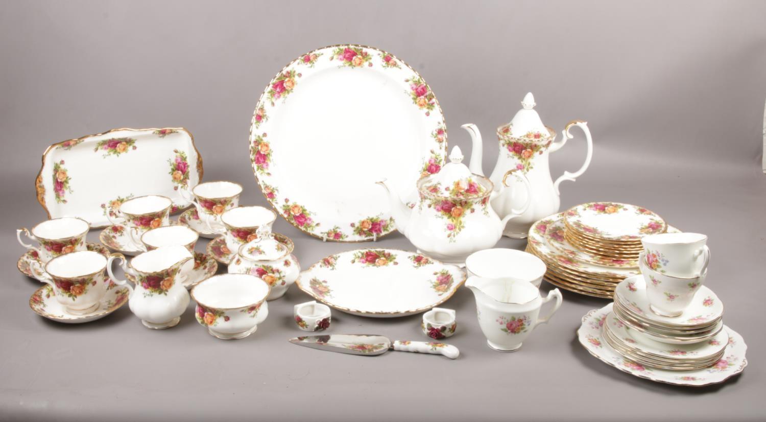 A quantity of fine bone china, mostly Royal Albert "Old Country Rose", comprising of, teapot, coffee