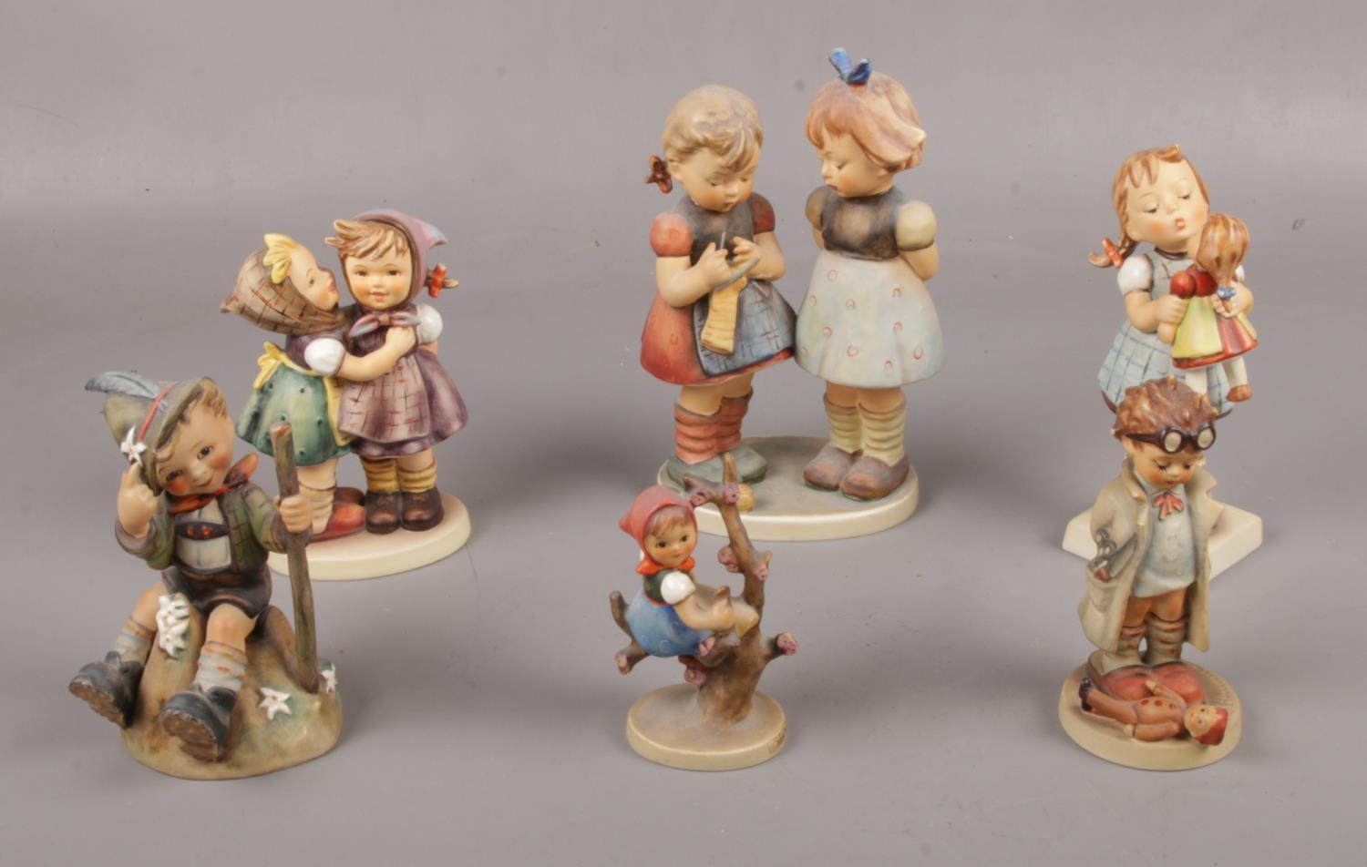 Six Goebel ceramic figure's, Telling her Secret Hum 196, Knitting Lesson Hum 256, Kiss Me Hum 311