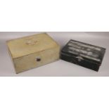 A Siroma safe/money tin box along with another metal money tin box. Smaller example locked, no