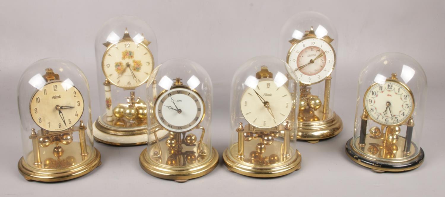 Six German torsion clocks, to include Balsie, Koma, Kundo and a Haller Eurastyle.