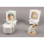 Four Beatrix Potter ceramicware, Royal Albert Mrs. Rabbit and Peter, Wedgwood money box, The Tale of