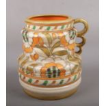 A Crown Ducal vase designed by Charlotte Rhead, shape 211, signed to base.