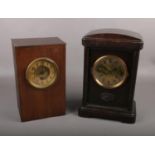 Two wooden Mantel clocks, the largest measuring 34cm height, 23cm width and 14cm depth.