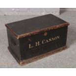 A painted wooden twin handled chest, stencilled L H Casson, purportedly belonging to the RAF