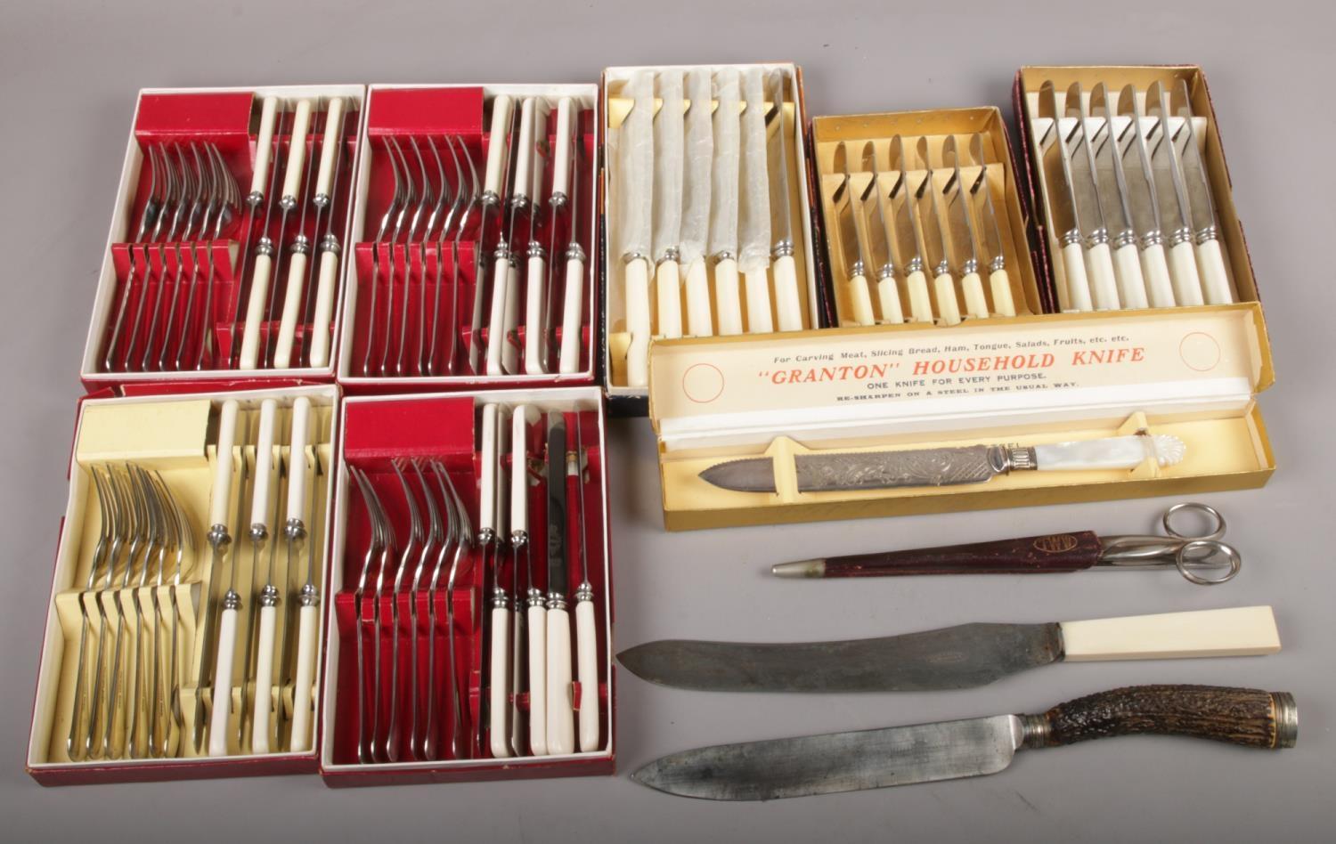 A collection of mainly boxed cutlery, to include Joseph Rodgers & Sons carving knife, TWW scissors