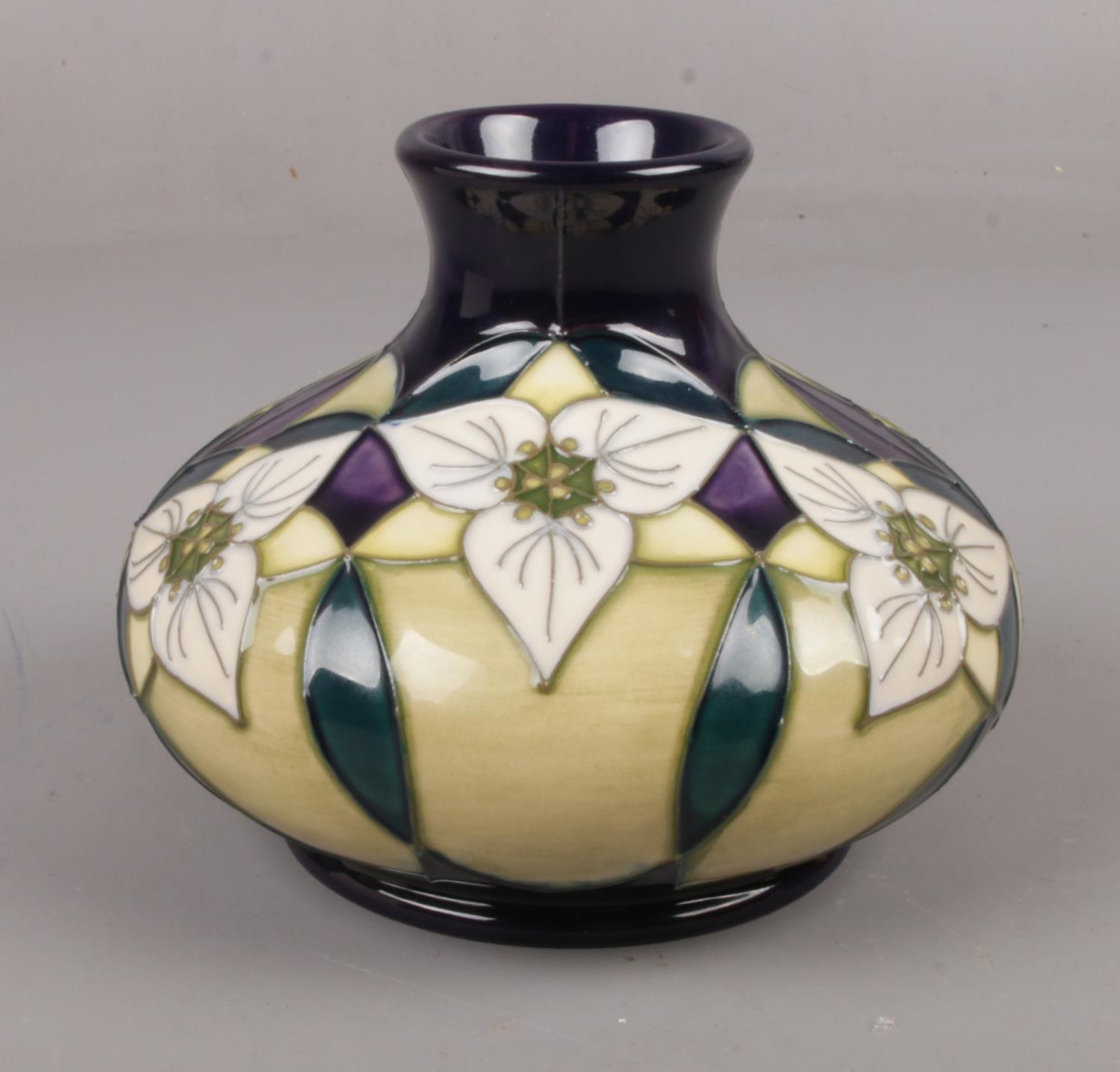 A Moorcroft Trial ' Trillium' vase, dated 15.1.02, 12cm height, impressed with marks on base Good