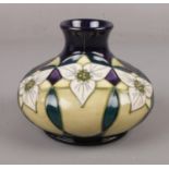 A Moorcroft Trial ' Trillium' vase, dated 15.1.02, 12cm height, impressed with marks on base Good