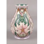 A Moorcroft contemporary vase, 14cm height, impressed marks on base Good condition.