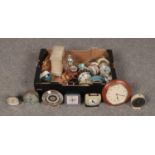 An assorted box of clocks to include, Three "Smith" alarm clocks, an Acctim wall clock and travel