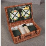 A Optima 4 person wicker picnic basket, plates, cutlery, flasks, cups etc