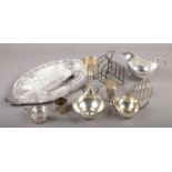 A collection of silver plate, to include hors d'oeuvres set, Prima sugar bowl and cream jug, toast