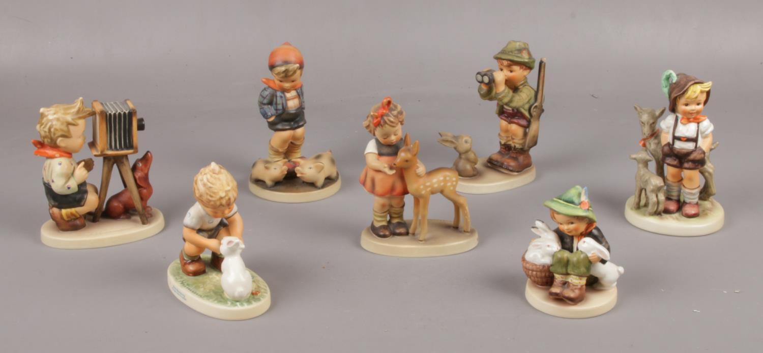 Seven Goebel ceramic figures, Farm Boy Hum 66, Playmates Hum 58, Friends Hum 136 examples to include