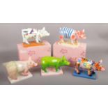 Five boxed ceramic Party Pigs to include Piggy En Pointe , Day at the Beach, Bottoms up, etc.