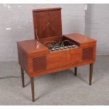 A HMV stereogram in a mahogany cabinet with a Garrard 3000 turntable