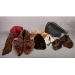 A collection of mostly vintage real fur collars/stoles, together with a paisley scarf and leather