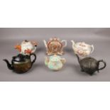 A selection of six teapots, to include a Burgess & Lee teapot and stand from the Aesthetic