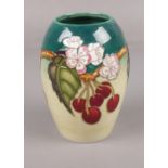 A contemporary Moorcroft 'cherries' ovoid vase, designed by DJ Hancock, 14 cm height, impressed mark