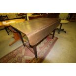 George III Oak drop leaf dining table with drawer